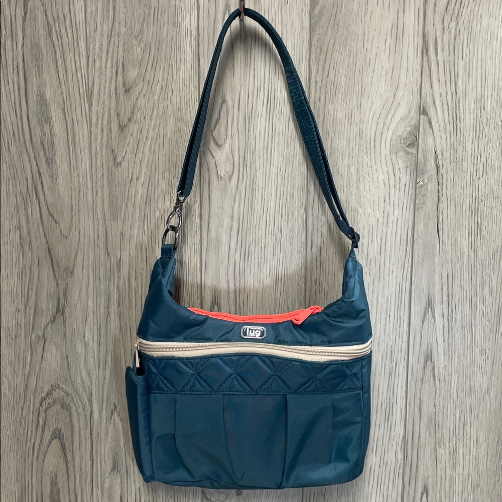NWOT Lug Swing Crossbody Messenger Bag w/ RFID Peacock Blue Water Bottle Holder